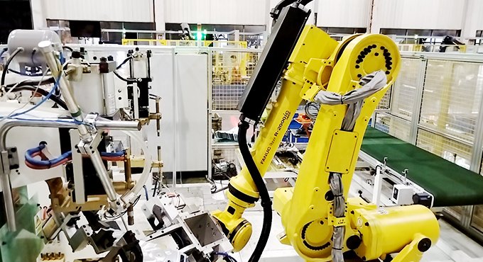 The working process of the fully automatic nut spot welding workstation