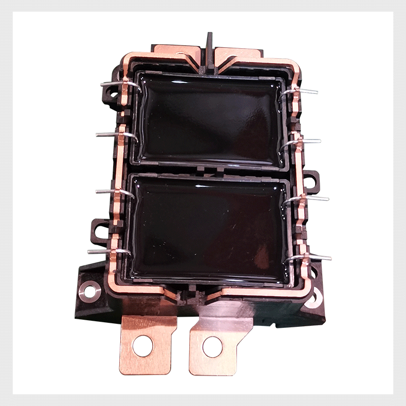 Capacitor lead clamping soldering